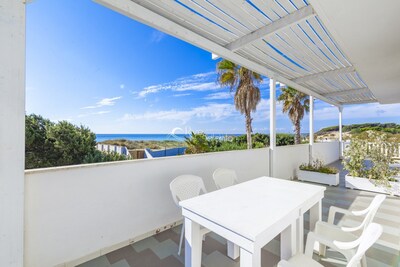 Apartments in residence in Punta Prosciutto with direct access to sandy beach