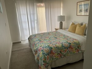First bedroom with the  queen bed 