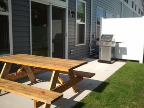 Rear Patio w/ Grill & Picnic Table.