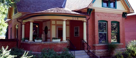 B H McCarty House, circa 1902. Wrap around front porch for use with ground floor