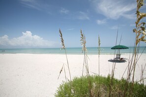 Enjoy the white sands of World Class Vanderbilt Beach, you can't get any closer!