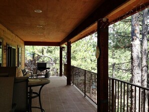 Upper floor deck is very large with dining and a grill and a smoker