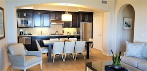 Fully Equipped Chef's Kitchen and Dining Area opens to Living Room