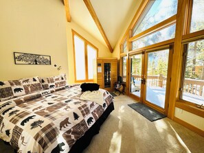 1st Bedroom - King Master with attached bathroom, sauna, and private balcony.
