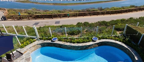 Pool and back bay view from the master bedroom balcony 