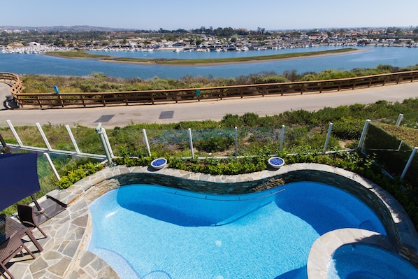 Pool and back bay view from the master bedroom balcony 