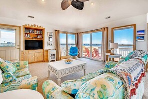 Great room with an abundance of natural light.