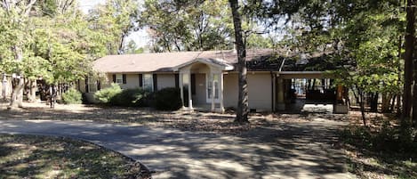 Front of House & circular concrete driveway with plenty of space for parking!