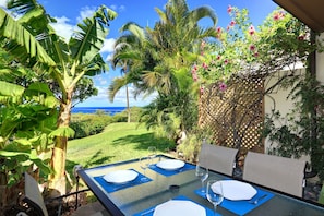 The quiet and very private lanai is perfect for meals and bird watching