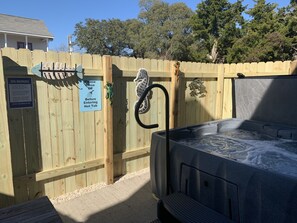 Backyard patio with hot tub