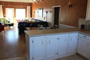 Kitchen and common area from the street side entrance.