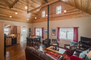 Feel the real cabin experience playing board games by the fire.