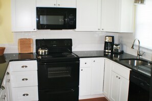 Updated kitchen with granite counter top 