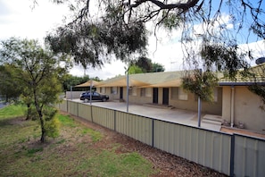 Private driveway with parking at the side