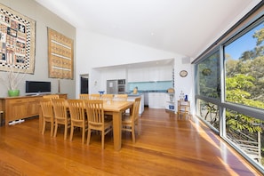 A spacious and airy dining area to enjoy meals with friends and family.