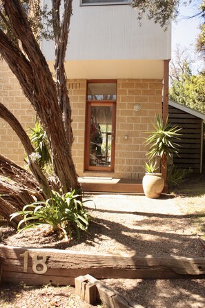 Nestled among the ti-trees, close to the National Park