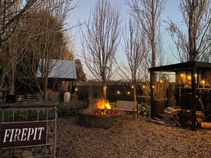 outdoor fire pit and seating...firewood supplied