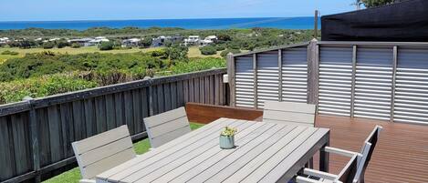 Sunny deck looking onto the beach, Point Lonsdale lighthouse & Bergola Wetlands