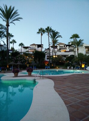 Night time view from the year around heated pool