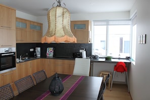 Kitchen and dining area - Apartment 1
