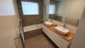 Bathroom with shower over bath