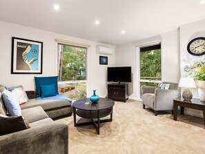 Sit back and relax in our gorgeous living room.