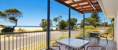 Balcony overlooking lake and ocean