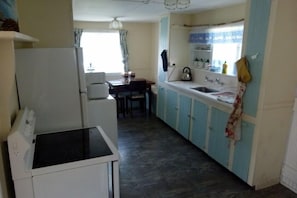 Self-catering kitchen with glass top cooker