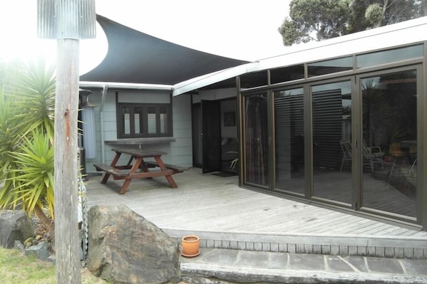 One of two outdoor decks with shade cloth