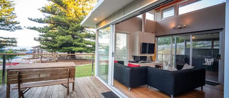 Wide sliding doors to bring outside to inside.