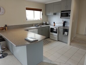 Fully equipped kitchen with everything you need to cook your own meals.