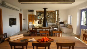 On the Stone House side: Living room , kitchen, spa and bathroom.