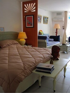 Interior of the studio with a king size bed and a sleeper sofa