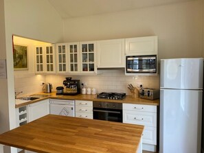 Kitchen has everything you need ! We also have a bar fridge