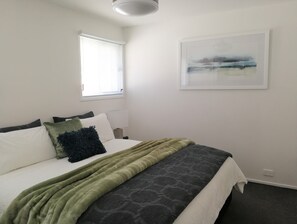 Main bedroom set up with a king bed - can be 2 single beds