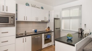Fully equipped kitchen with full size appliances