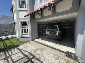 Garage for one vehicle with electric gate.  Please Always Wait Until Closed.