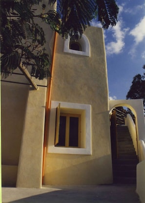 Guest house lefthand with mimosa tree