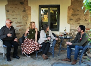 Guests enjoying themselves on the front verandah.