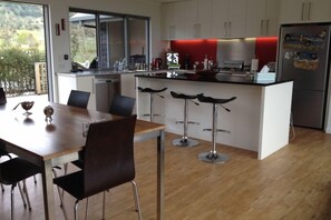 View of dining area and kitchen