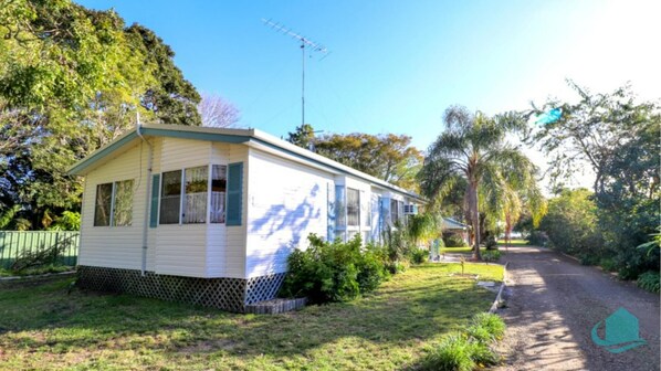 Front of house on park like grounds