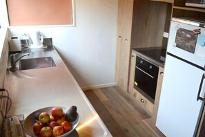 New kitchen features a fantastic oven with pizza option