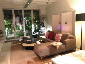 living room with seamless connection to garden