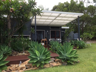 Luxury accommodation in beautiful Scott's Head. Best of beach and bush views.