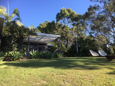 Luxury accommodation in beautiful Scott's Head. Best of beach and bush views.