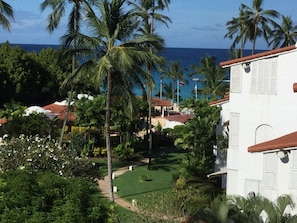 View from balcony to beach bar-restaurant-concierge area