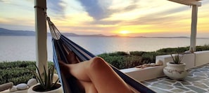 Vista Ariadne's terrace is the best place to relax & enjoy captivating sunsets.