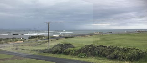 View from the front of the house - golf course and beach right there!