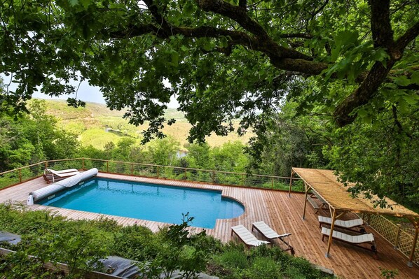 pool deck with Dordogne river