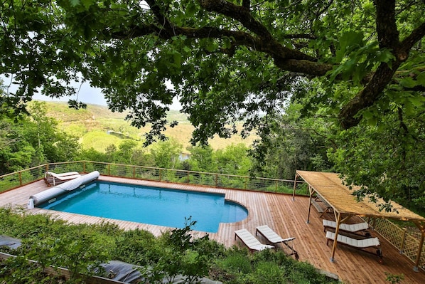 pool deck with Dordogne river